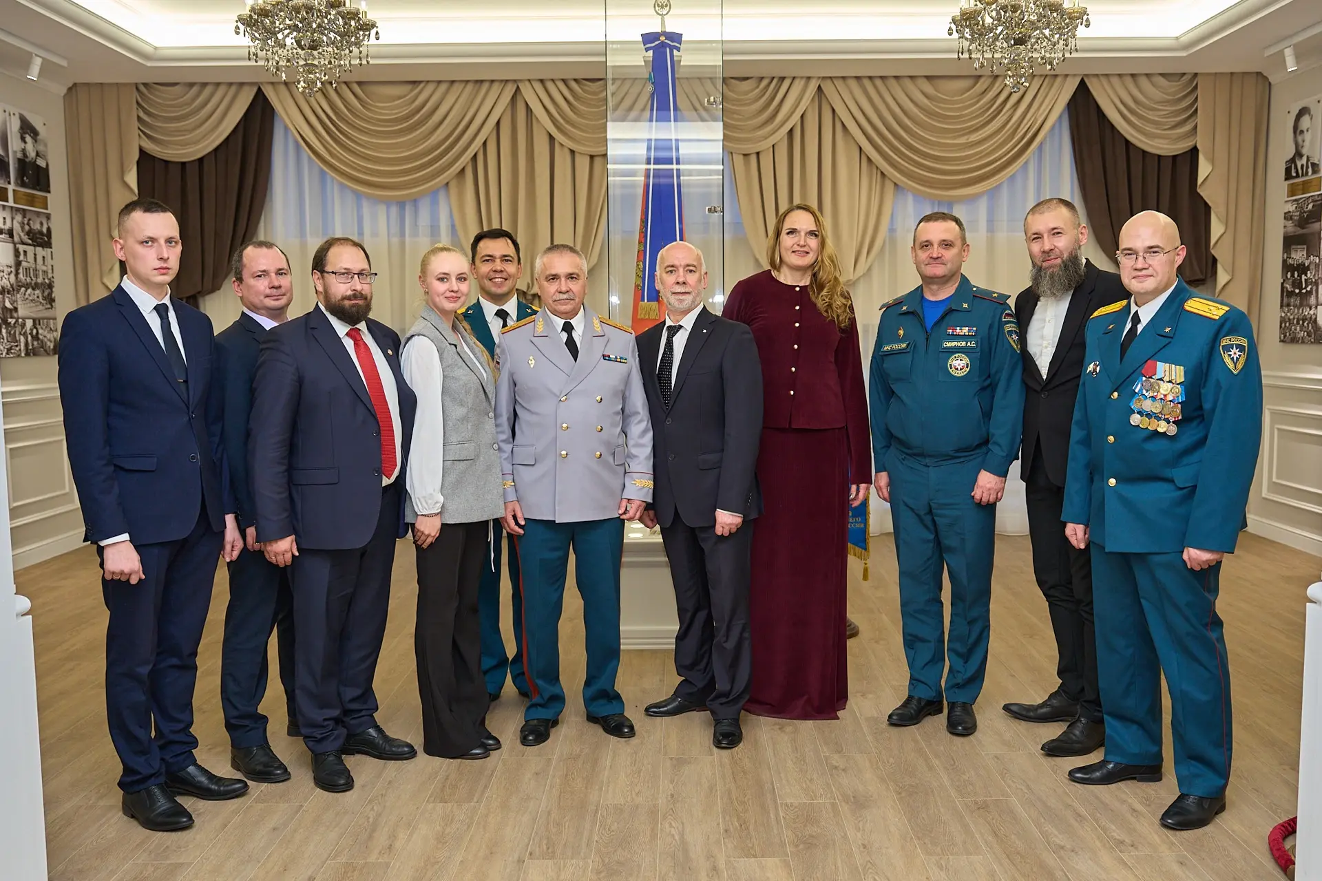 Group photo of event participants indoors.